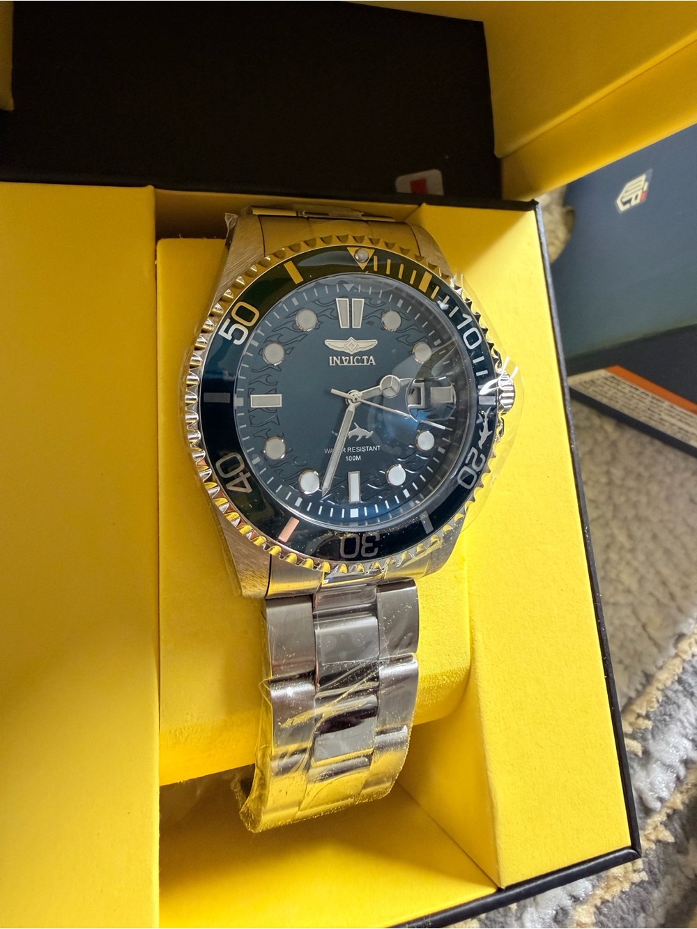 Invicta Silver Tone Watch with Black Dial and Bezel